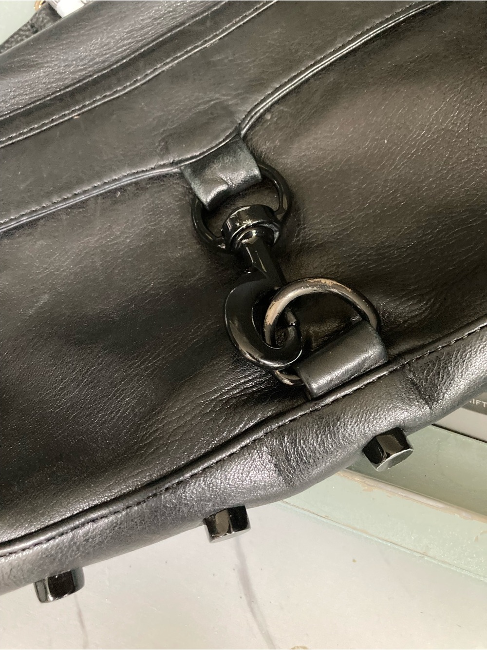 Black Leather Crossbody Bag with Graphic Strap